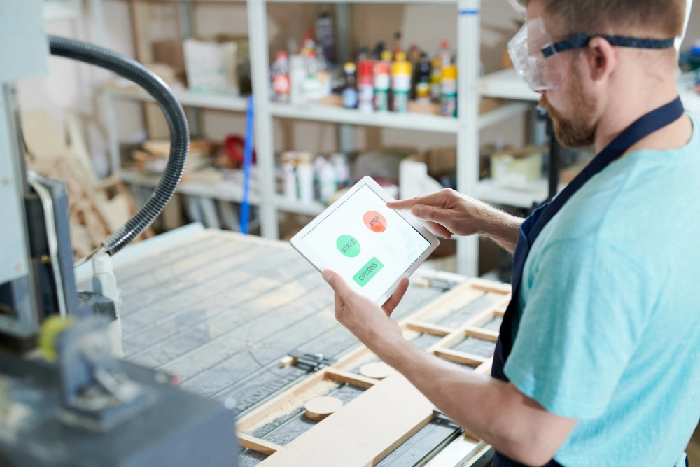 Worker holding a tablet